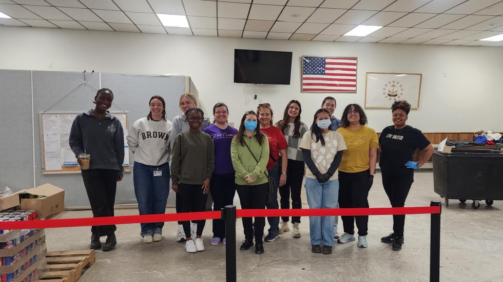 A volunteer group of students and staff at the local food bank.